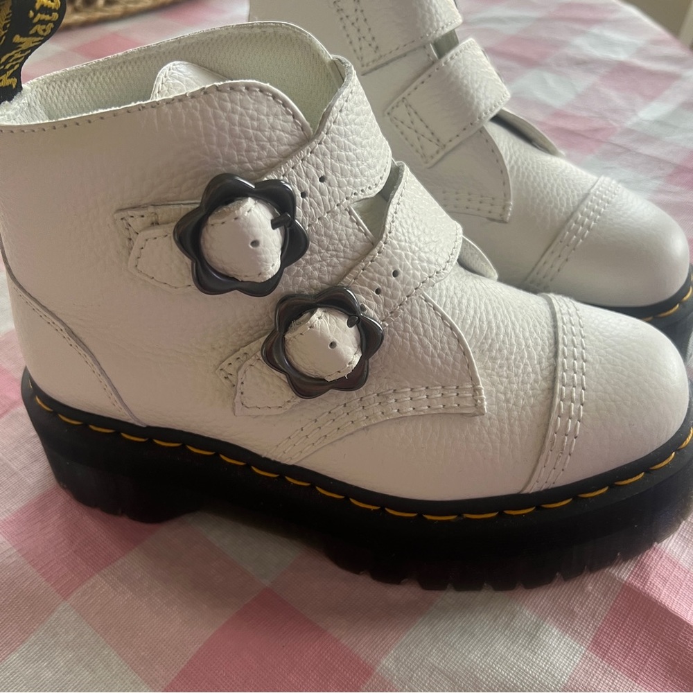 Dr. Martins white platform heart buckle.